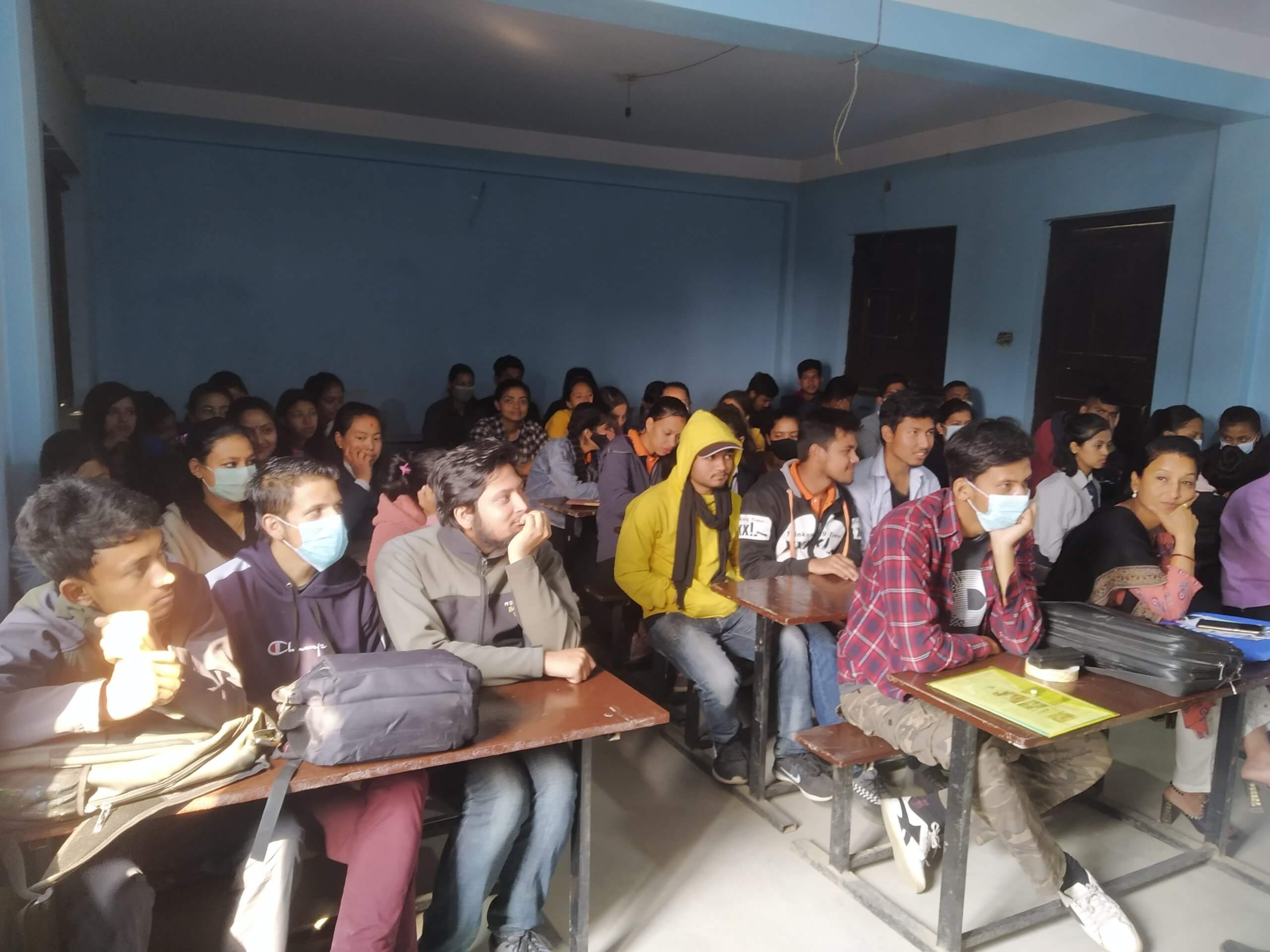 Students learning together in a classroom at Indreshwor Campus.